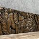 Central Africa 20th century: carved wooden panel in bas-relief of elephants