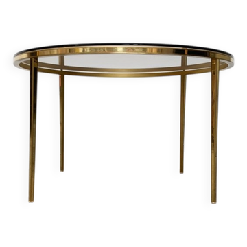 Mid-century Hollywood Regency style coffee table in brass and glass, made in Germany by Vereinigte Werkstätten, 1960s.