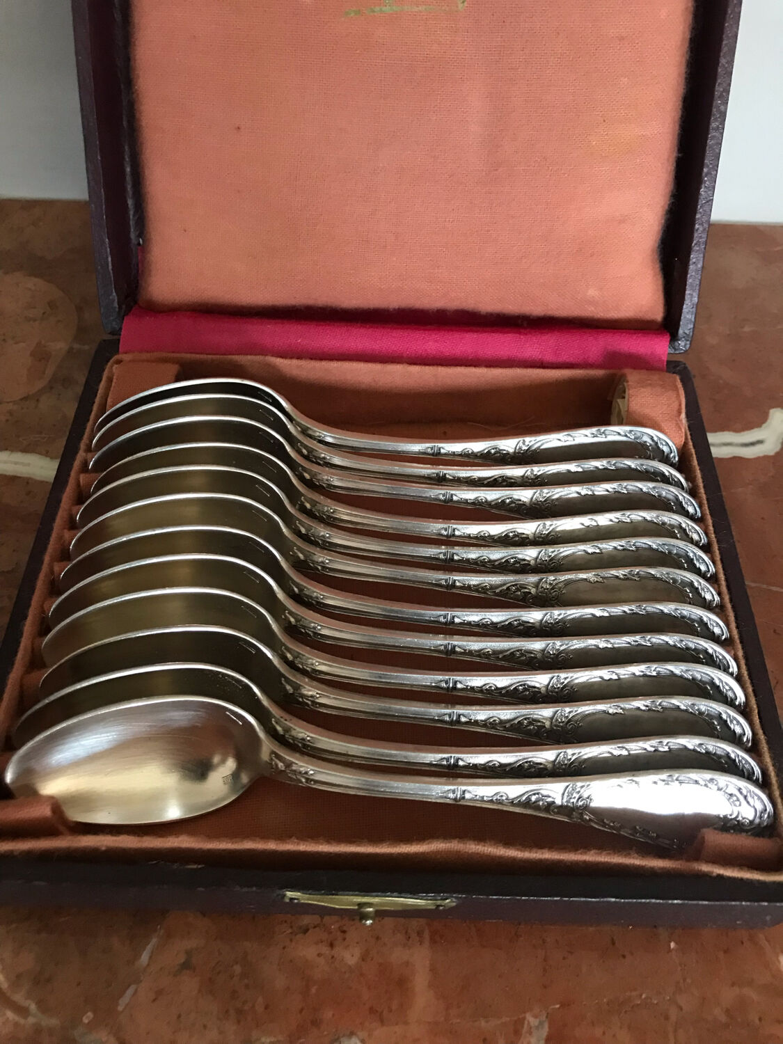 Series of 12 small silver metal spoons