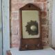 Wall-mounted coat rack mirror with solid wood hooks, brutalist mirror.