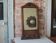 Wall-mounted coat rack mirror with solid wood hooks, brutalist mirror.