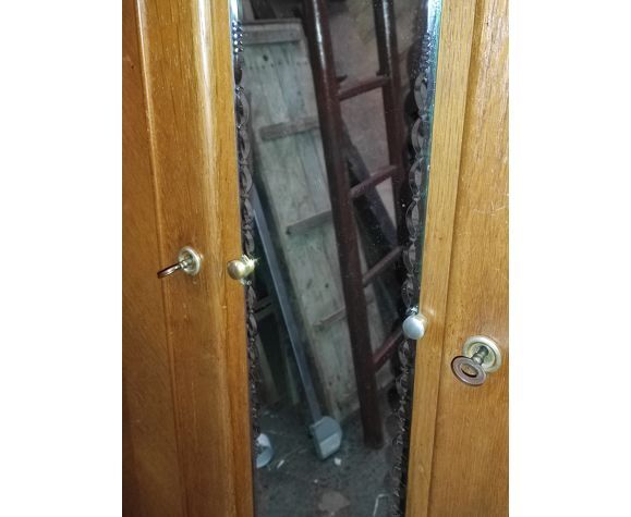 Vintage wardrobe with compass feet and central mirror Scandinavian style design