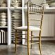 Napoleon III chair in gilded bamboo wood and beige cotton.