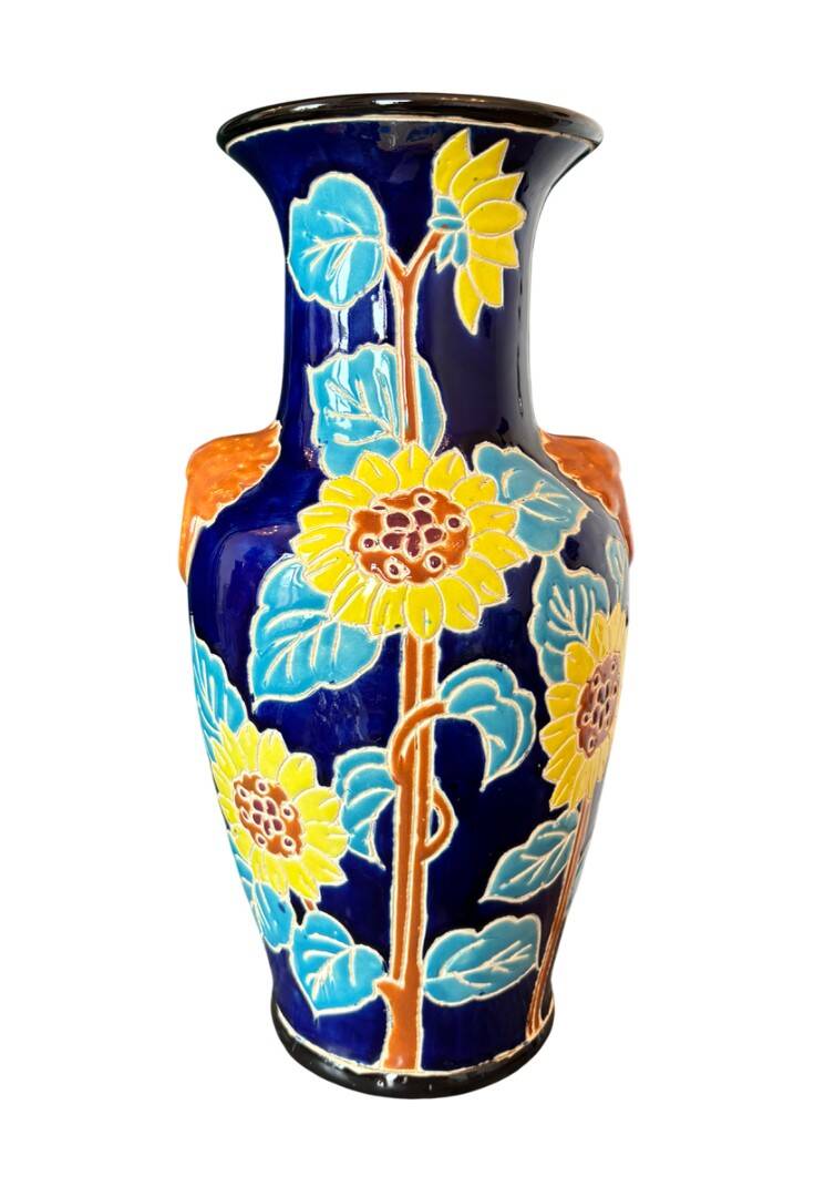 Ceramic vase with sunflowers