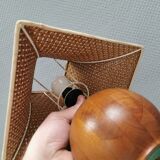 Very rare table lamp in turned teak wood with original braided shade. 1970s