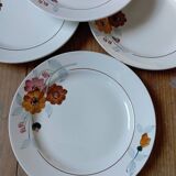 7 flowered dessert plates, St Amand factory, 1930