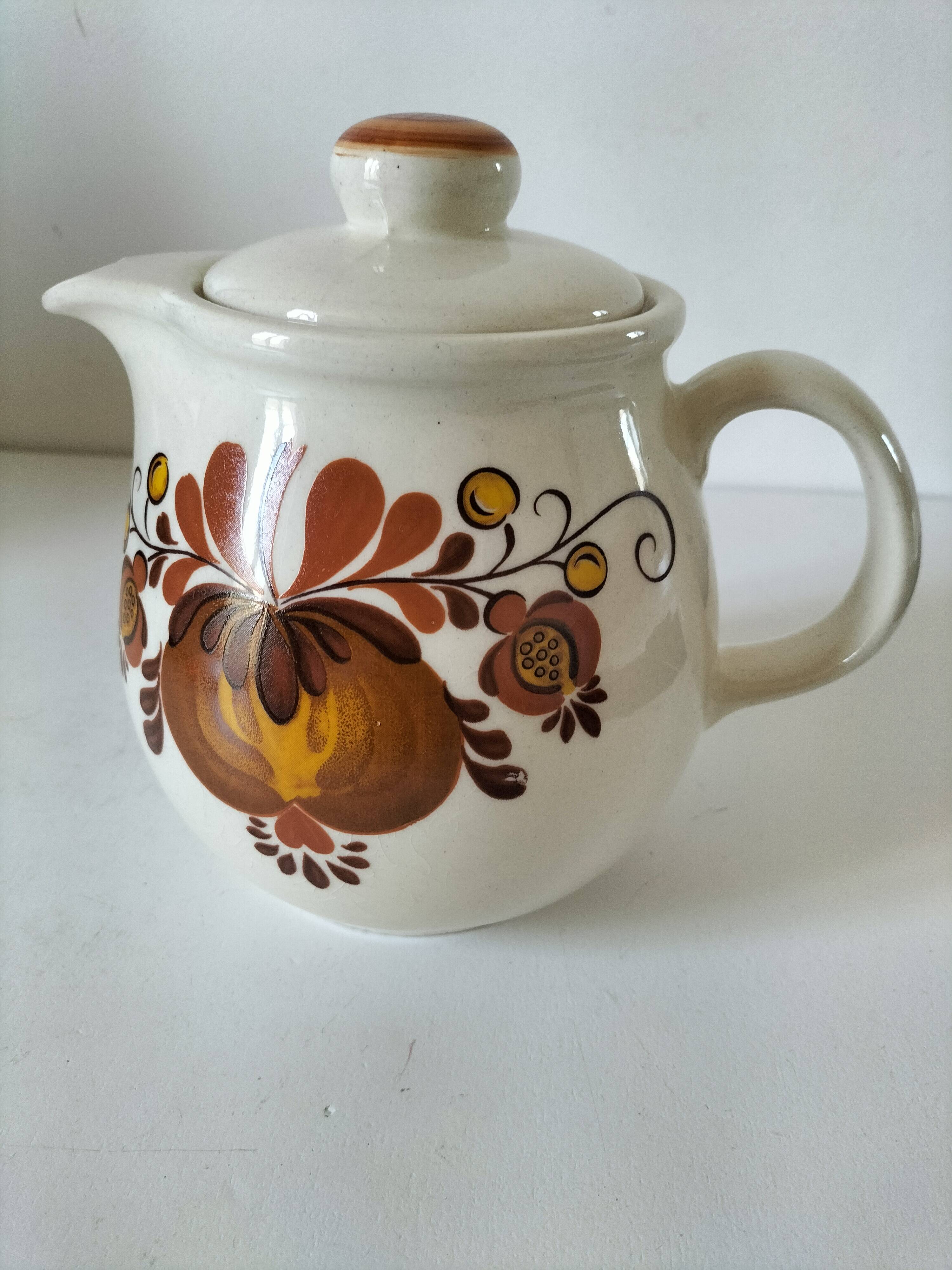 Brown floral patterned teapot from the 1970s.