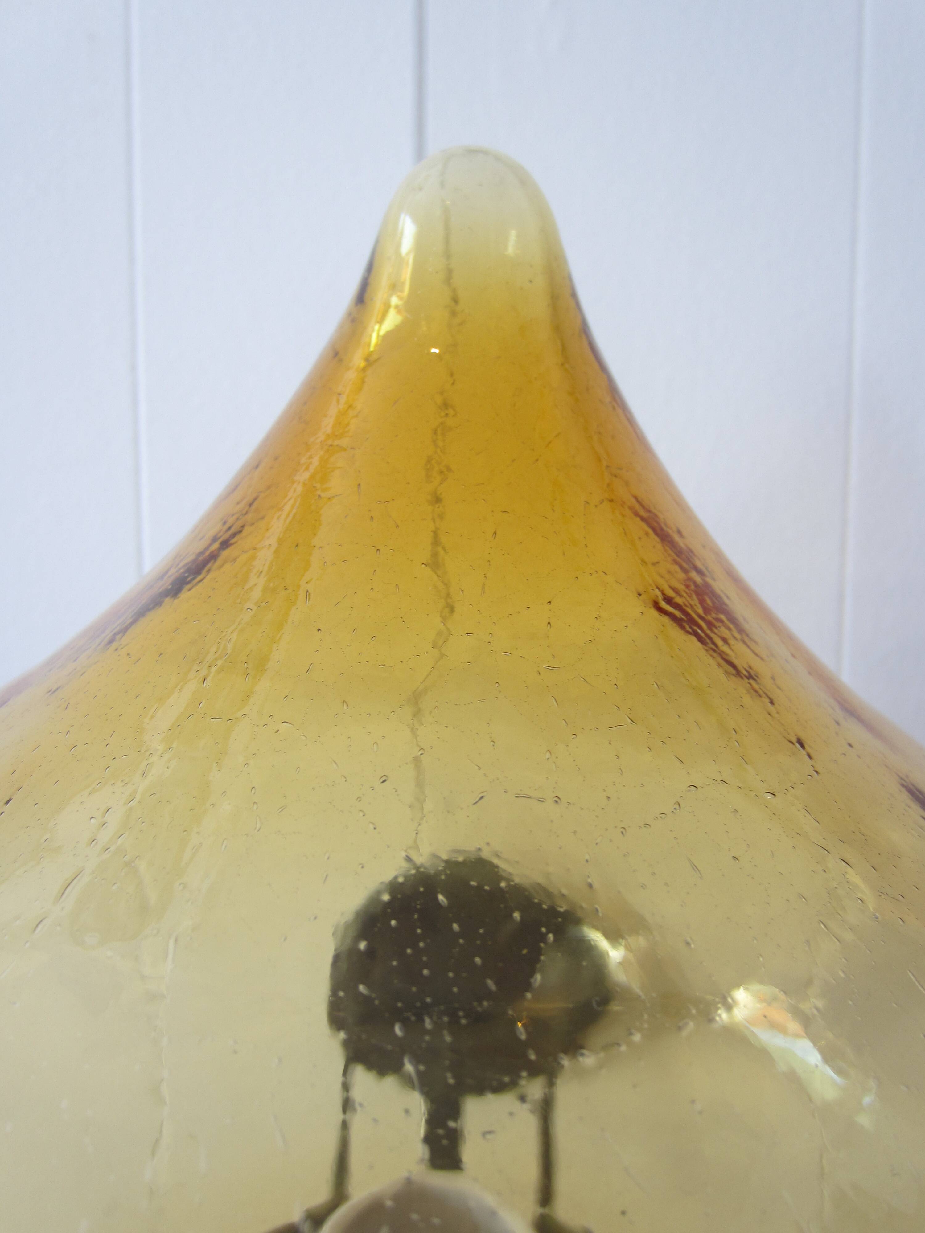 Scandinavian outdoor wall light in copper and amber glass