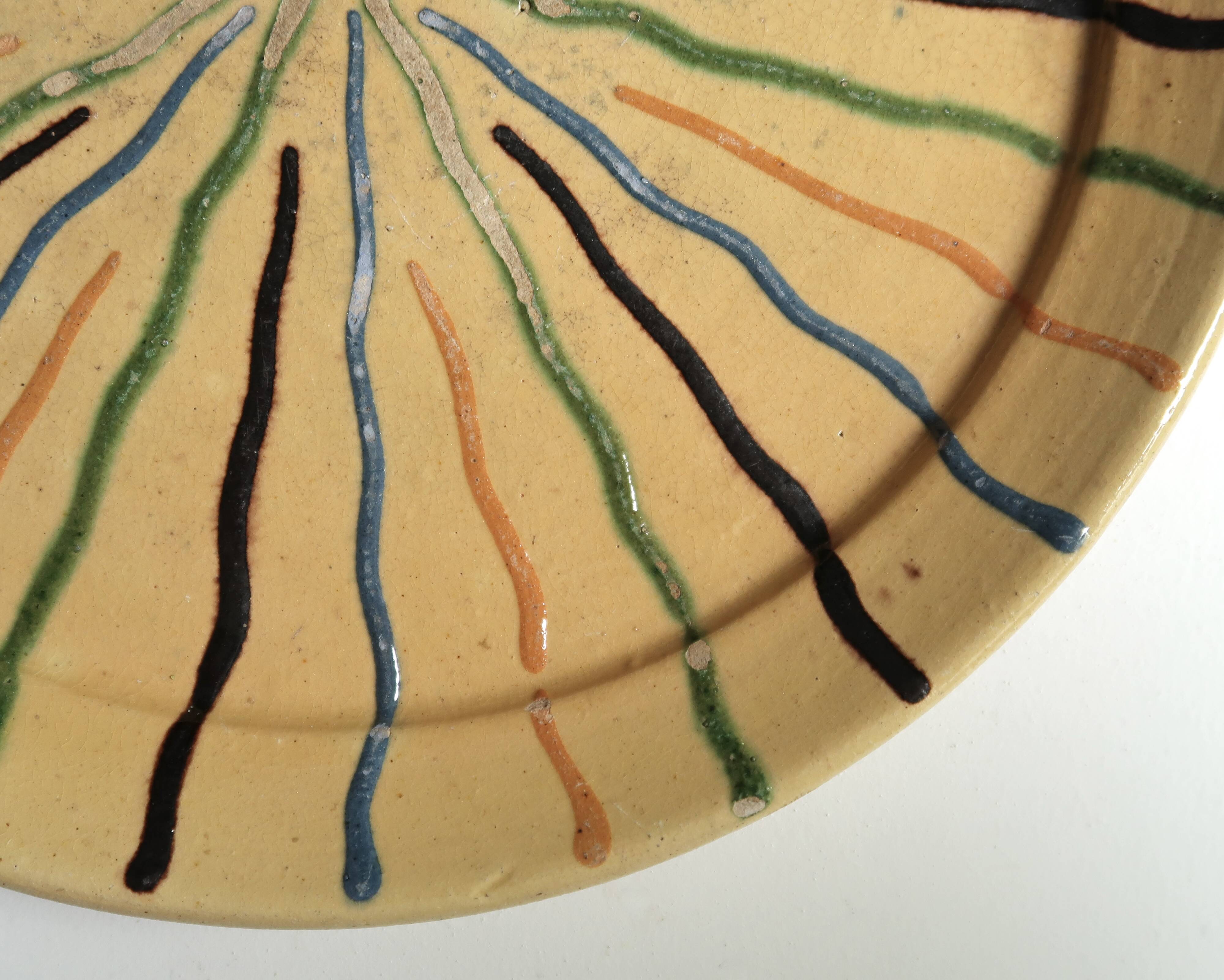 Red Provençal earthenware plate, sun decoration, Folk Art