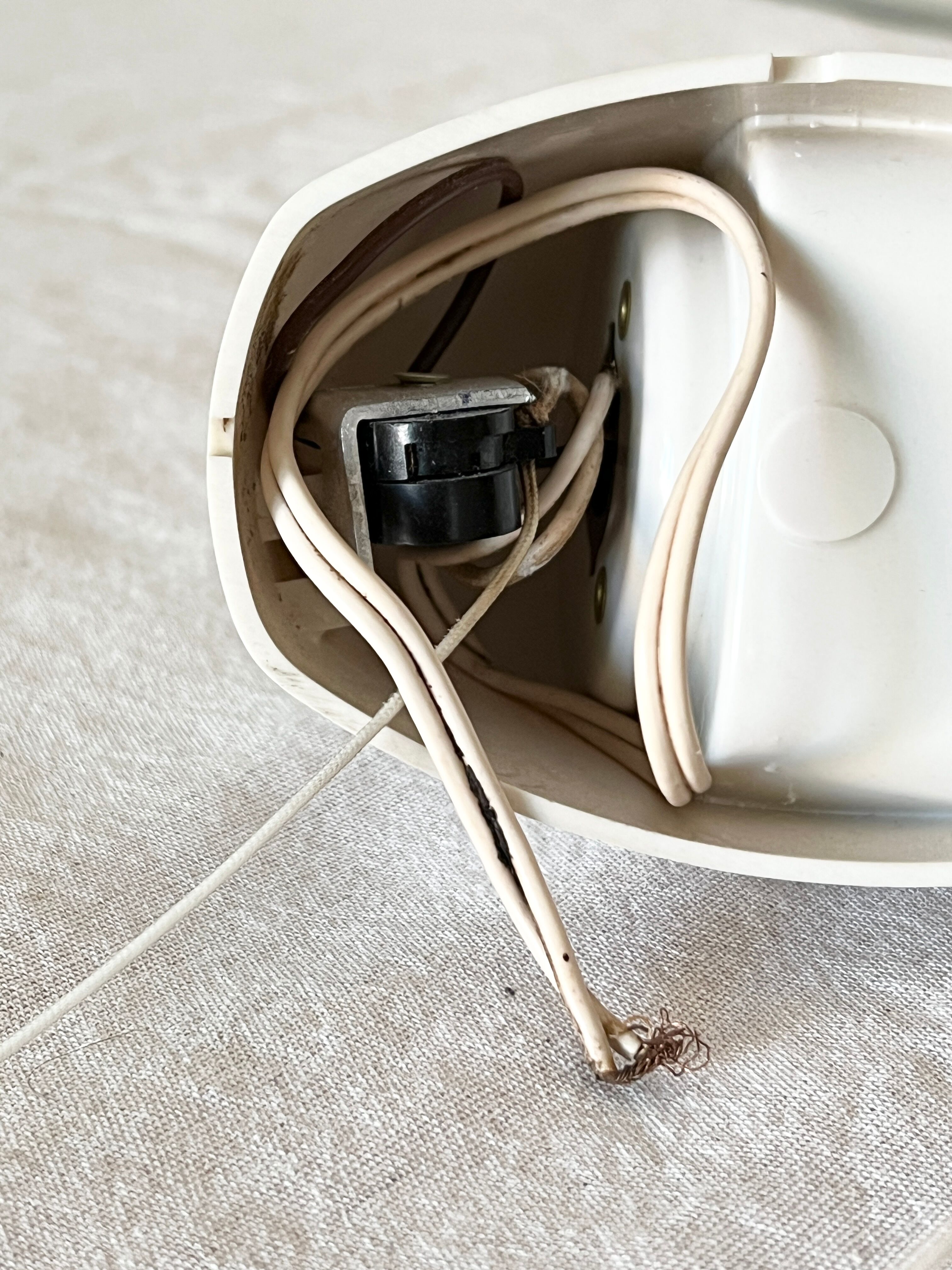 Set of two Small mid-century bakelite & glass wall lamps by Bo Niko Belgium, 1960s