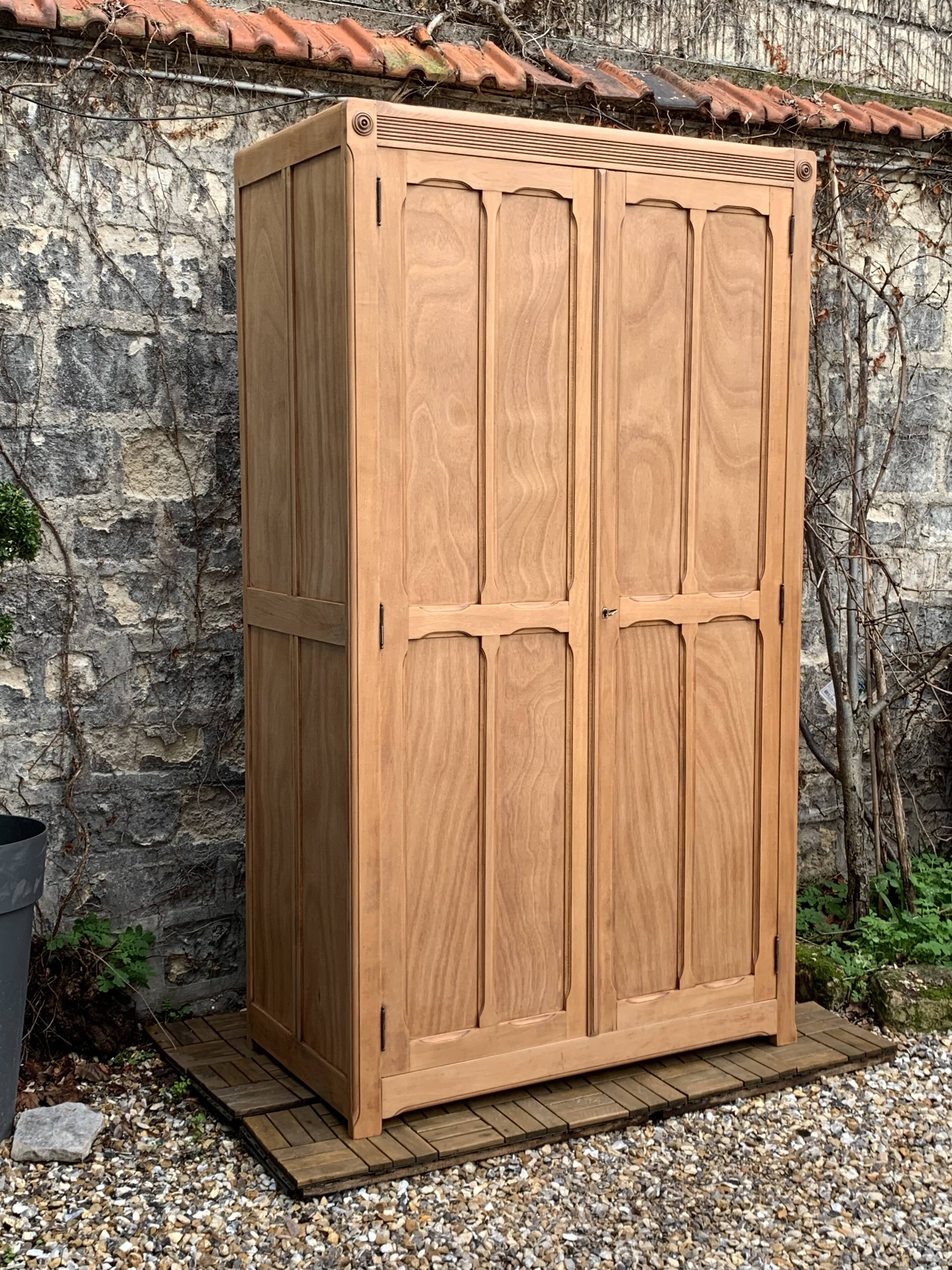 Parisian paneled cabinet in raw wood, 1940