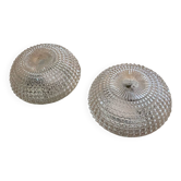 Large pair of round wall sconces ceiling lights in transparent glass.