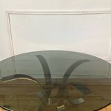 Round smoked glass coffee table from the 70s