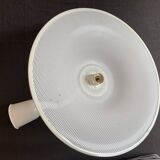 Suspension of the 80s in perforated white metal