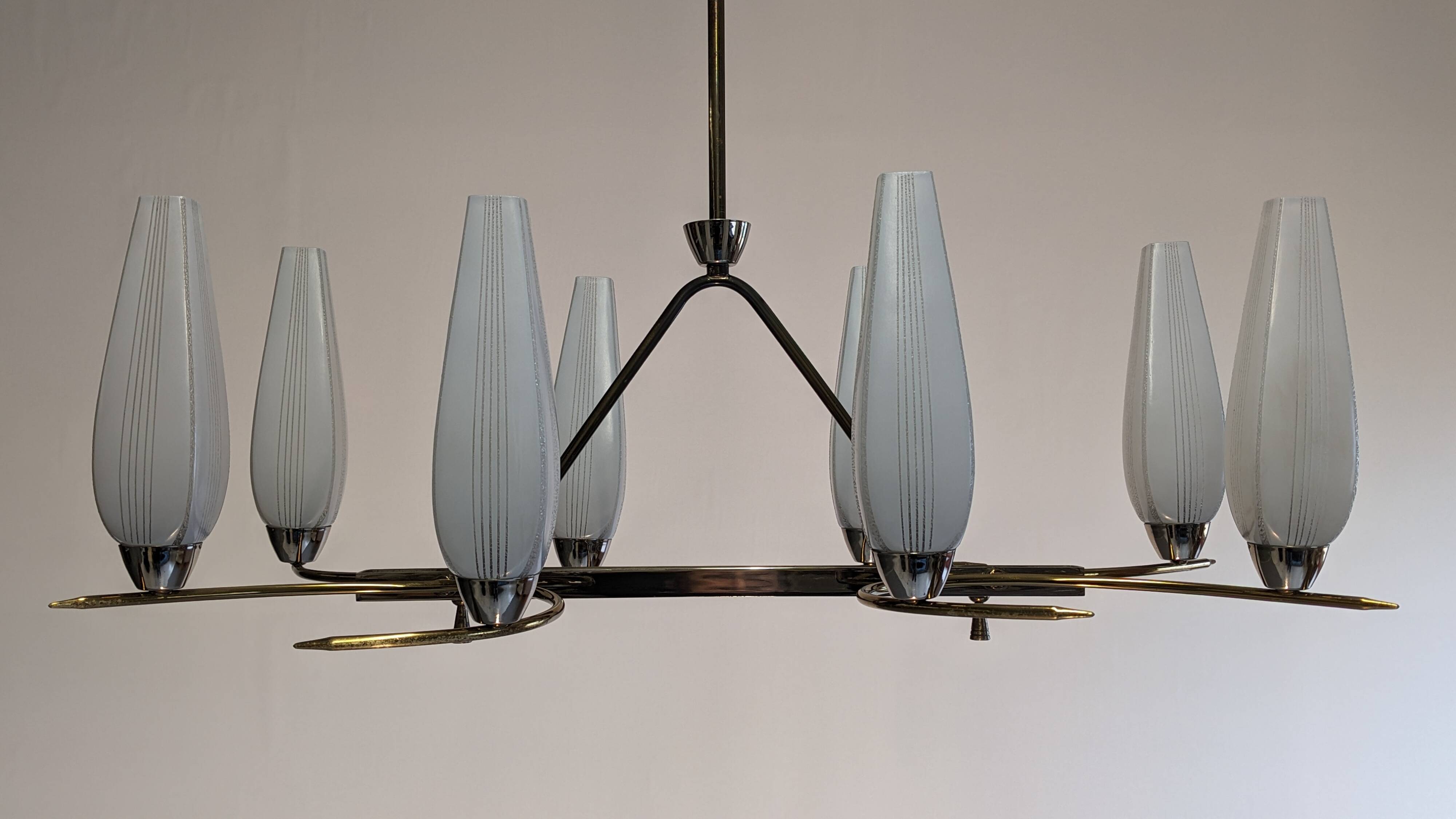 Eight-light chandelier in glass and brass, France circa 1960.