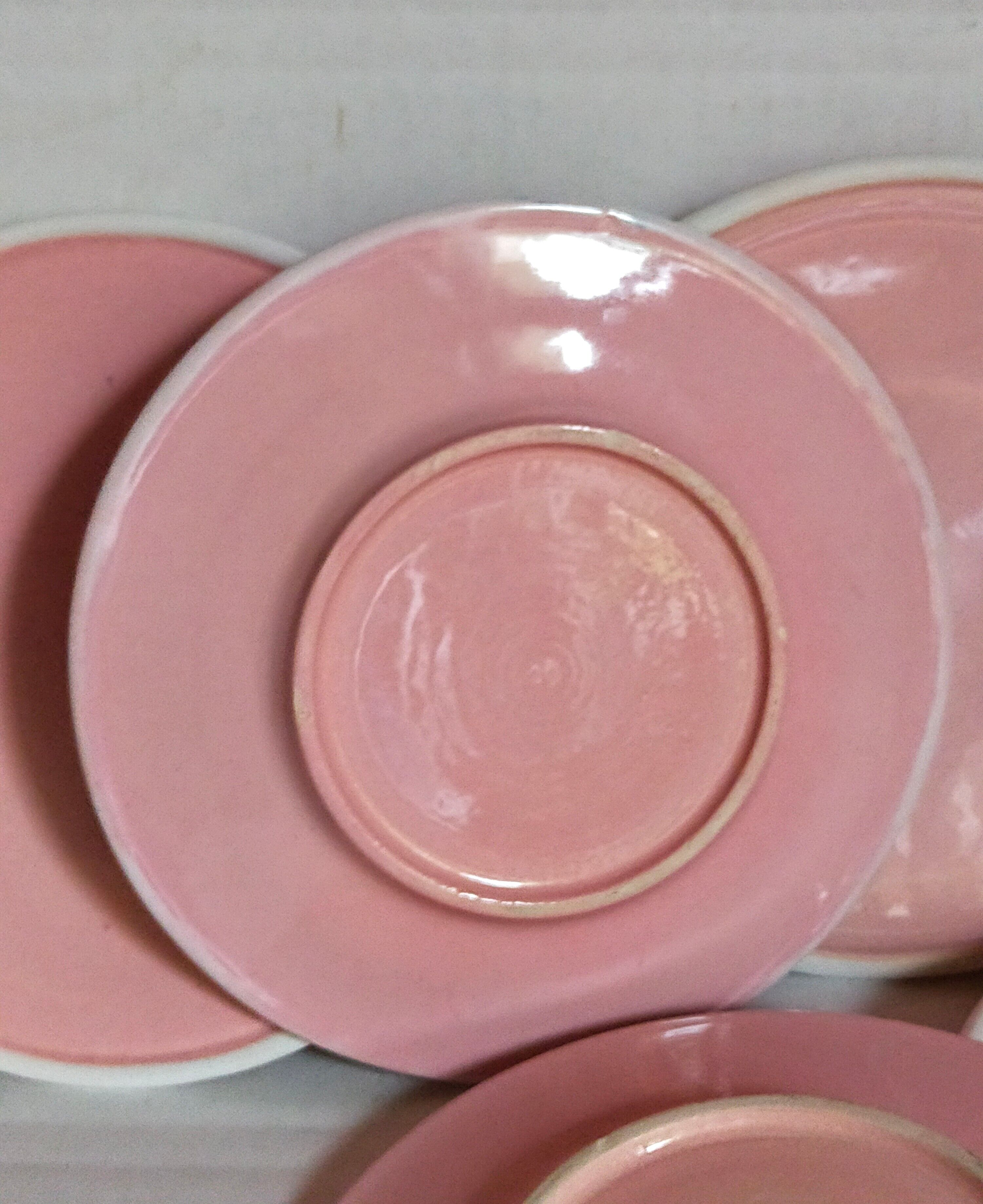 Six old pink earthenware dessert plates