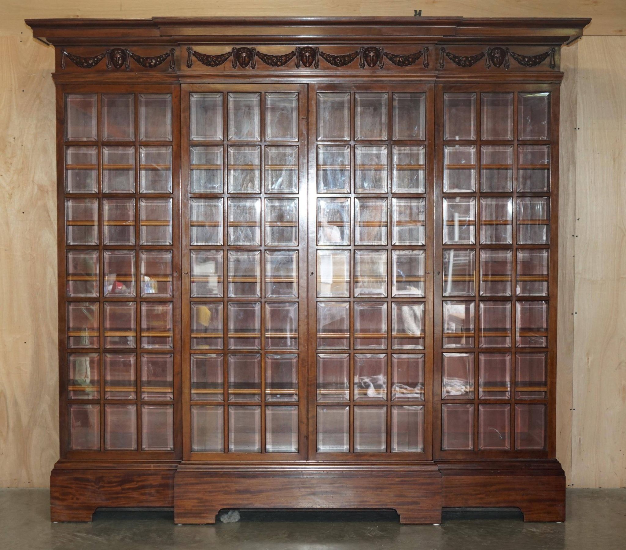 Monumental glass library in Victorian hardwood.