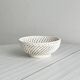 Antique twisted white porcelain basket