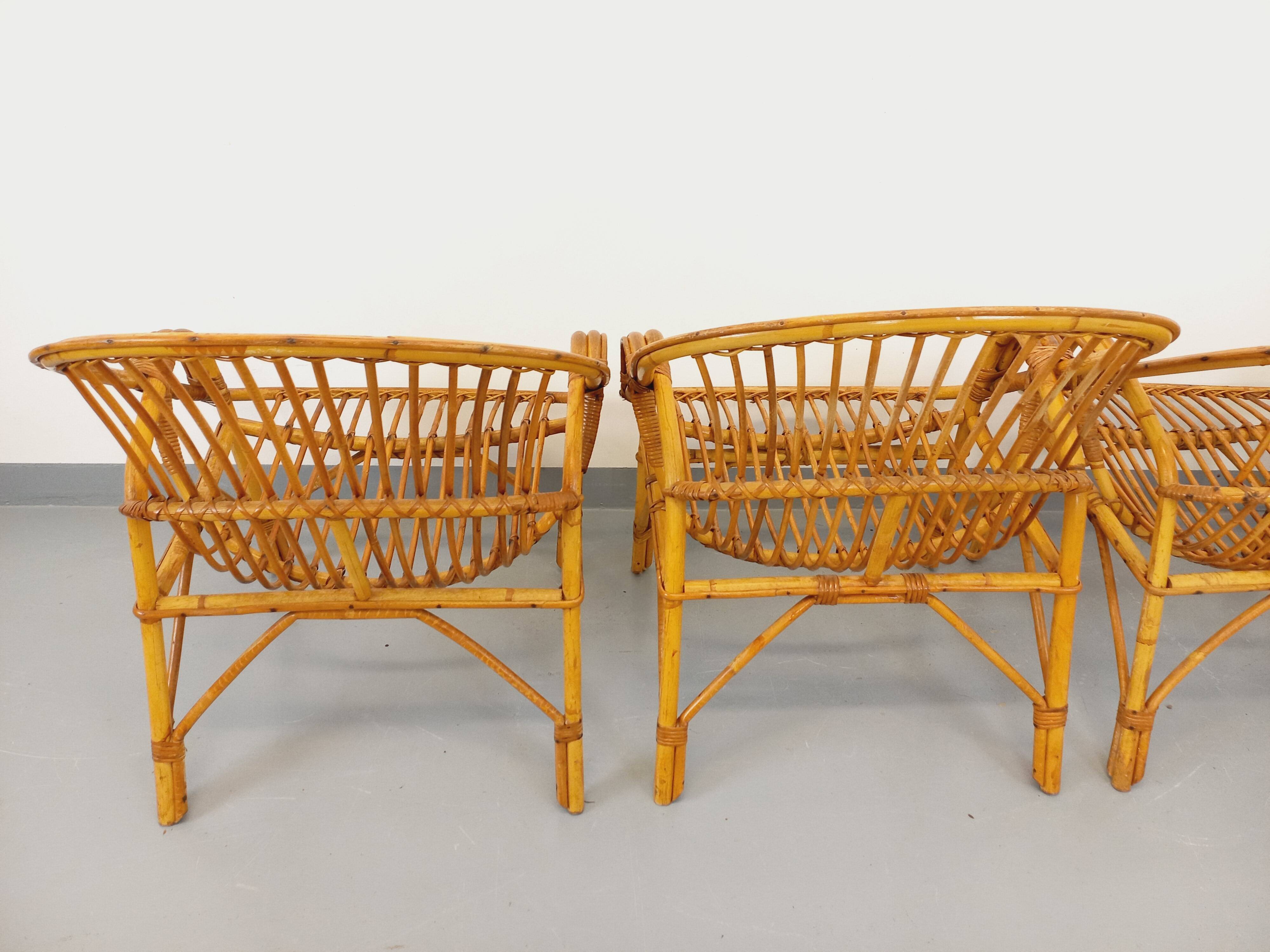 Set of 4 vintage rattan armchairs from the 60s