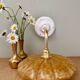 Antique wall lamp with yellow Clichy glass shade