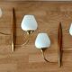 Pair of wood and gilded brass sconces 1950 boat hulls with 2 lights.