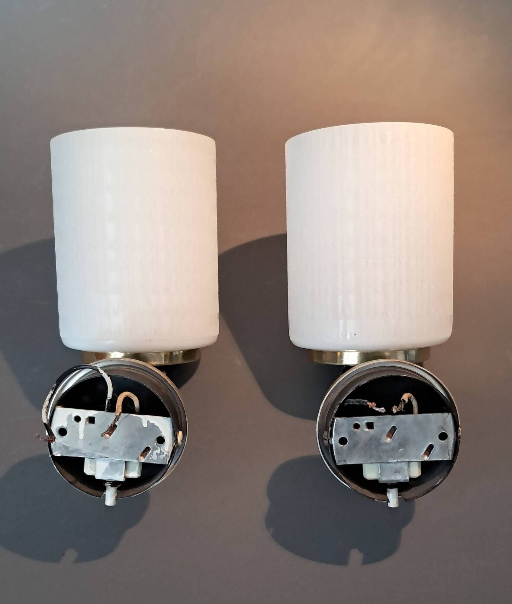 Pair of wall lights in gilded brass, black metal and opaline, 1960