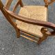 Louis Philippe country armchair in solid wood and straw, hooked armrests