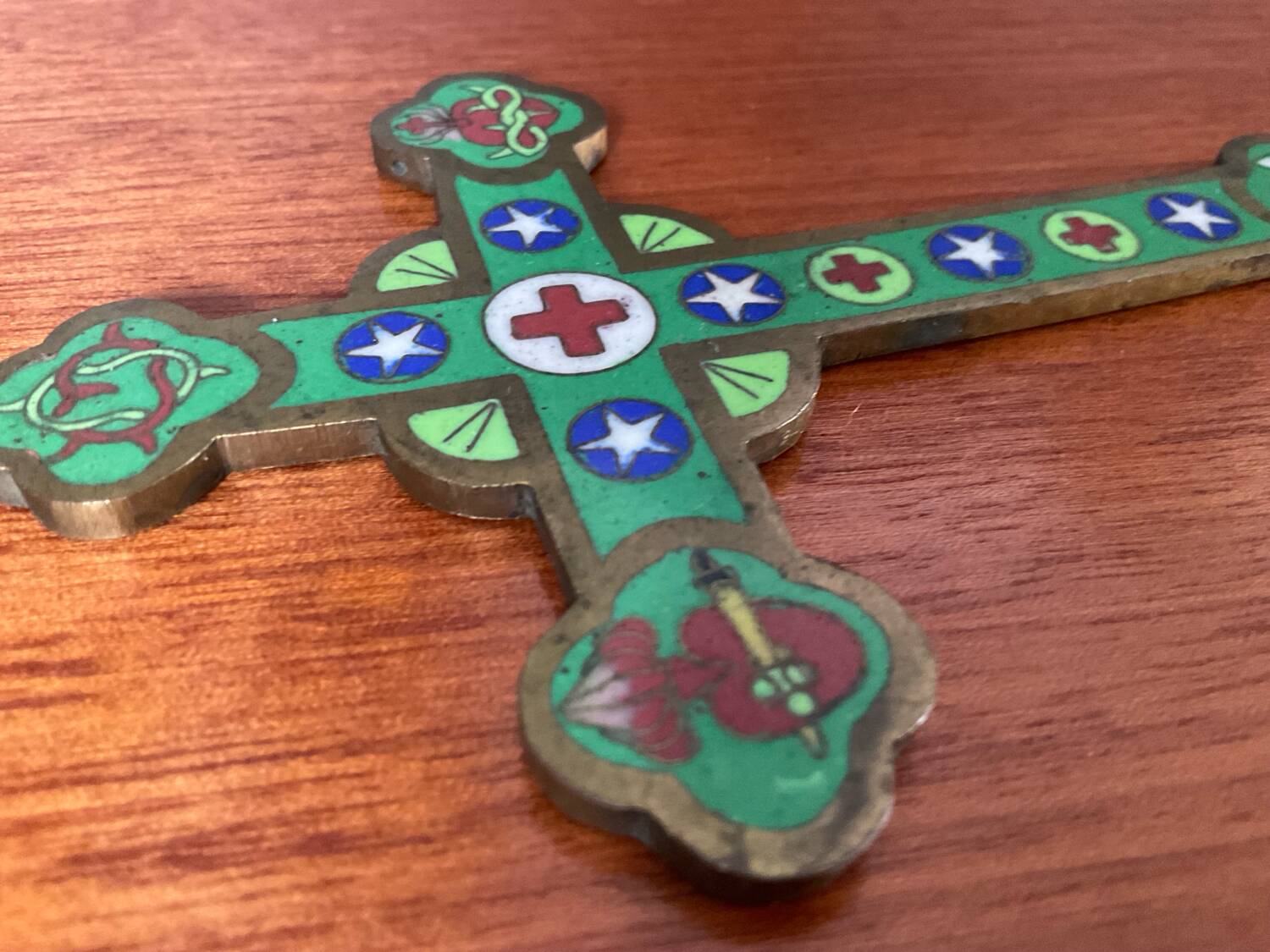 Old bronze cross with cloisonné enamel