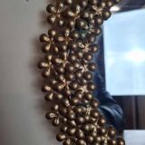 Vintage round mirror in gold metal circa 1950