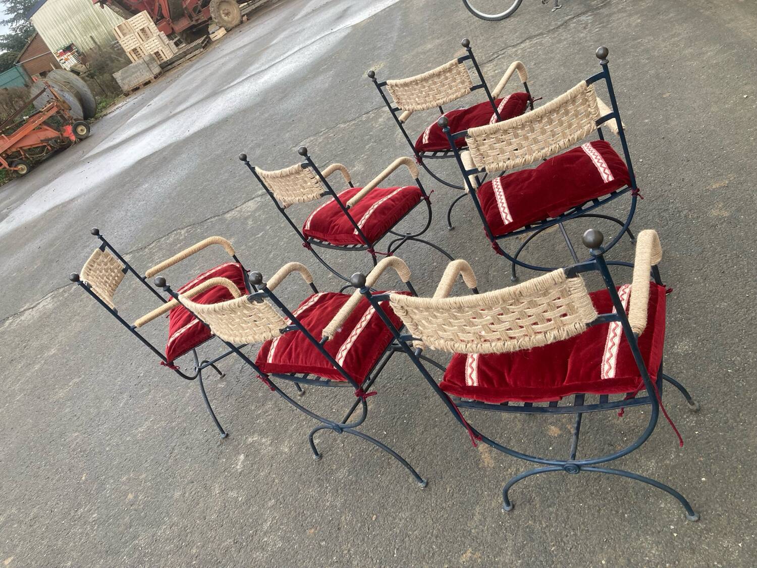 Six. Wrought iron armchairs, rope weaving.