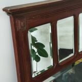 Antique beveled mirror on a wooden frame, 1930