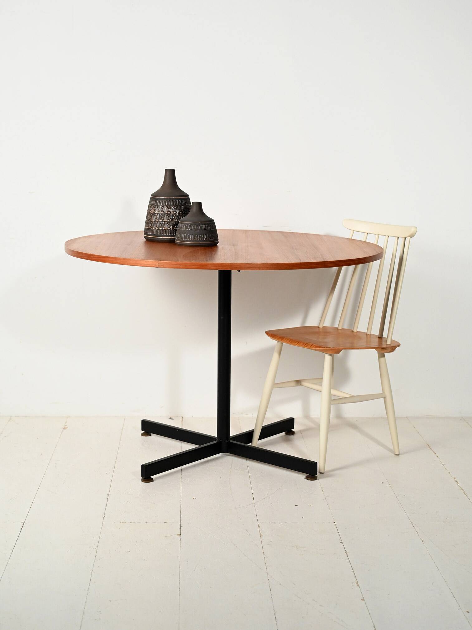 Round Scandinavian teak table with metal base