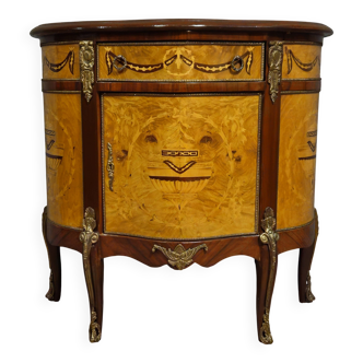 Half-moon commode in Louis XV style with marquetry and bronze decorations.