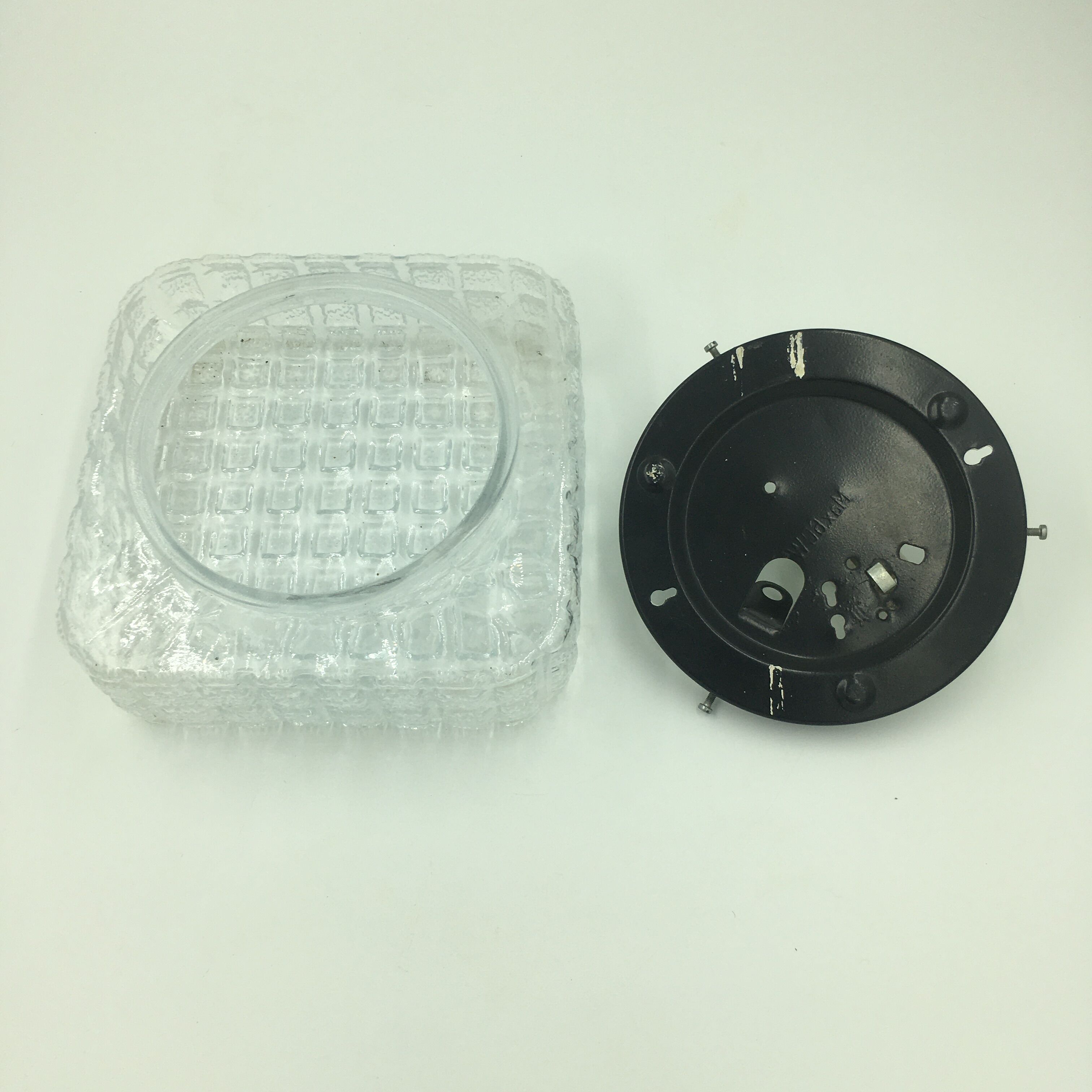 Ceiling lamp in molded glass with relief