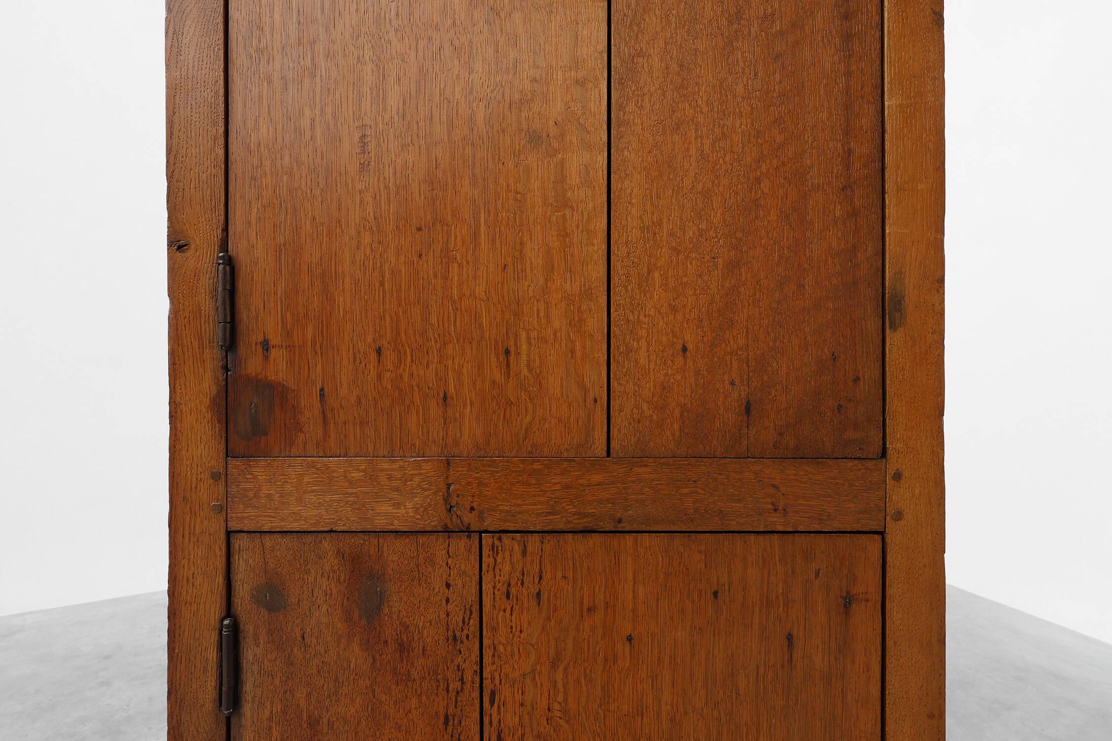 Tall rustic French monastery wardrobe in oak from the late 19th century