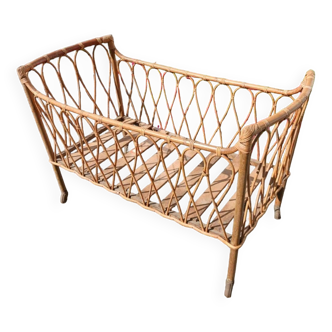 Vintage rattan crib from the 50s