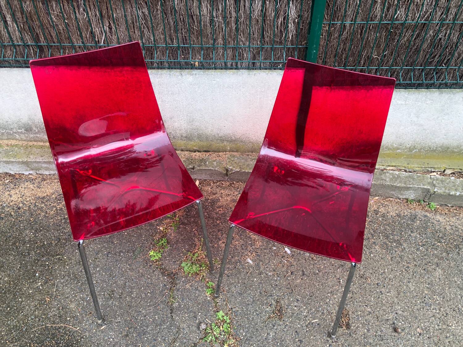 Pair of Foschia Plexiglas red designer chairs