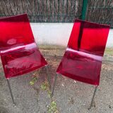 Pair of Foschia Plexiglas red designer chairs