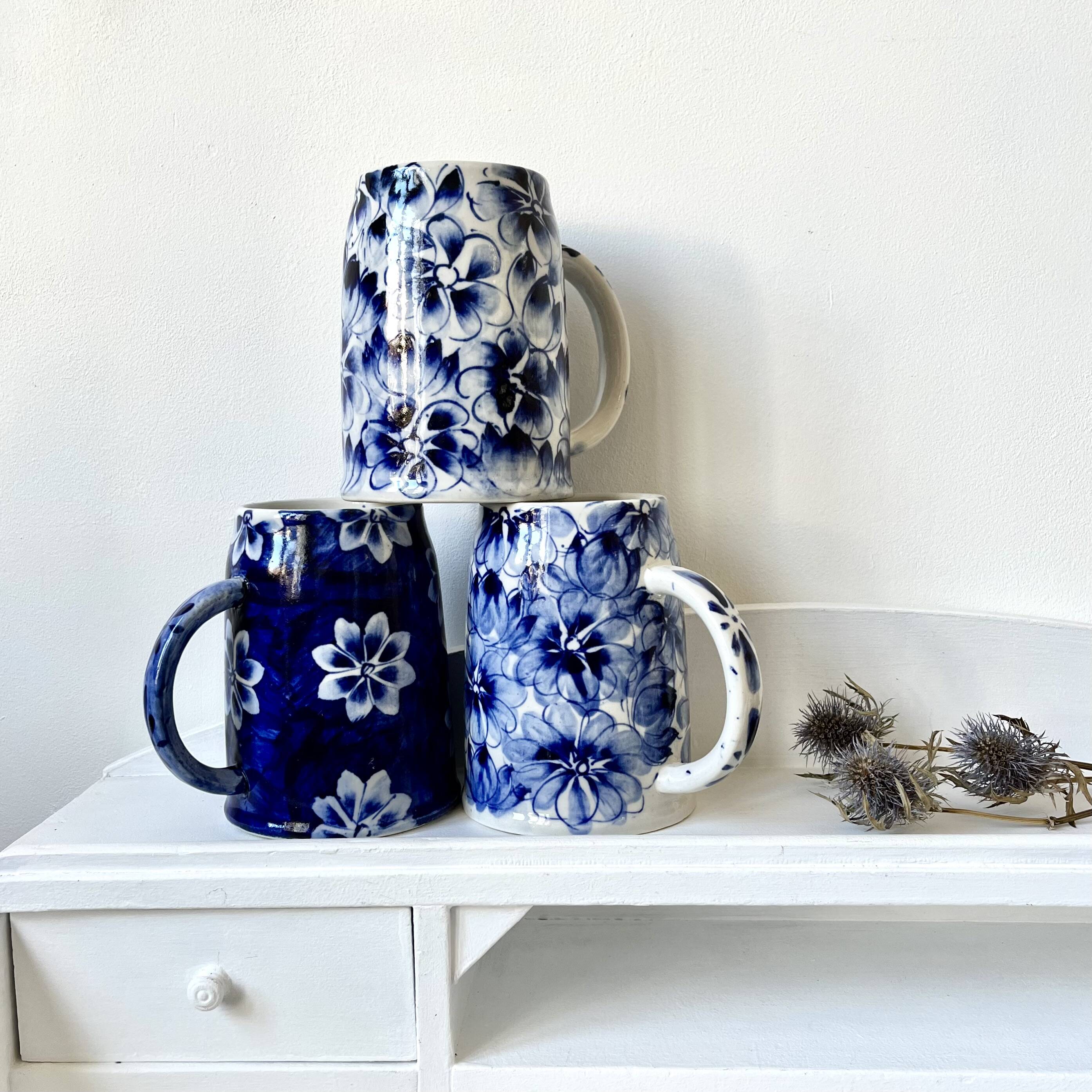 Blue flowered mugs or large tankards