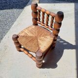 Low chair 50s oak and straw by the fire