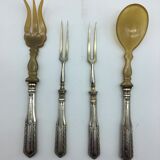 Box of filled silver salad cutlery