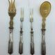 Box of filled silver salad cutlery