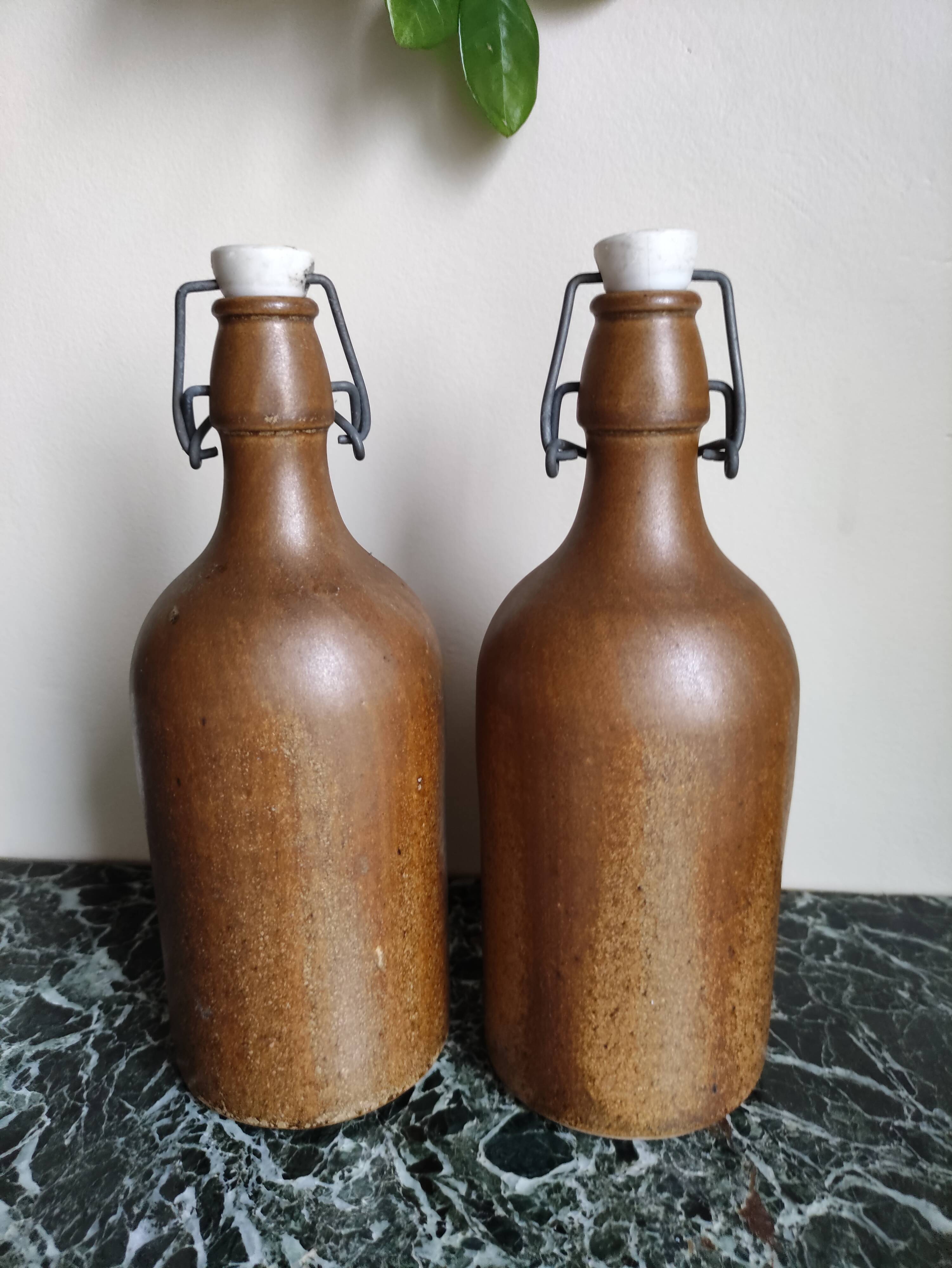 Lot 2 old bottles in glazed stoneware 0.5 L