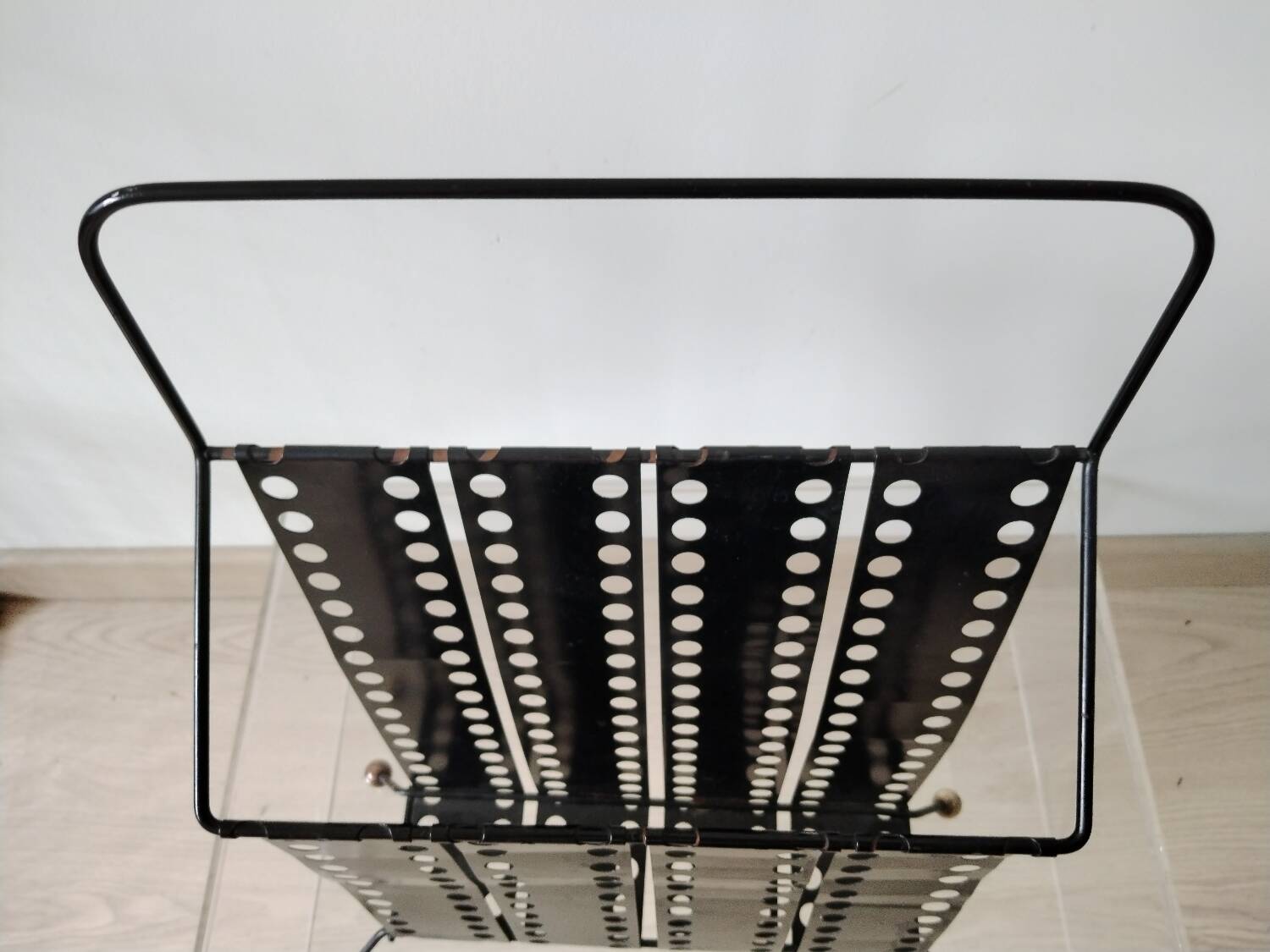 “Santiago” magazine rack in perforated sheet metal Mathieu Mategot 1950s