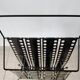 “Santiago” magazine rack in perforated sheet metal Mathieu Mategot 1950s