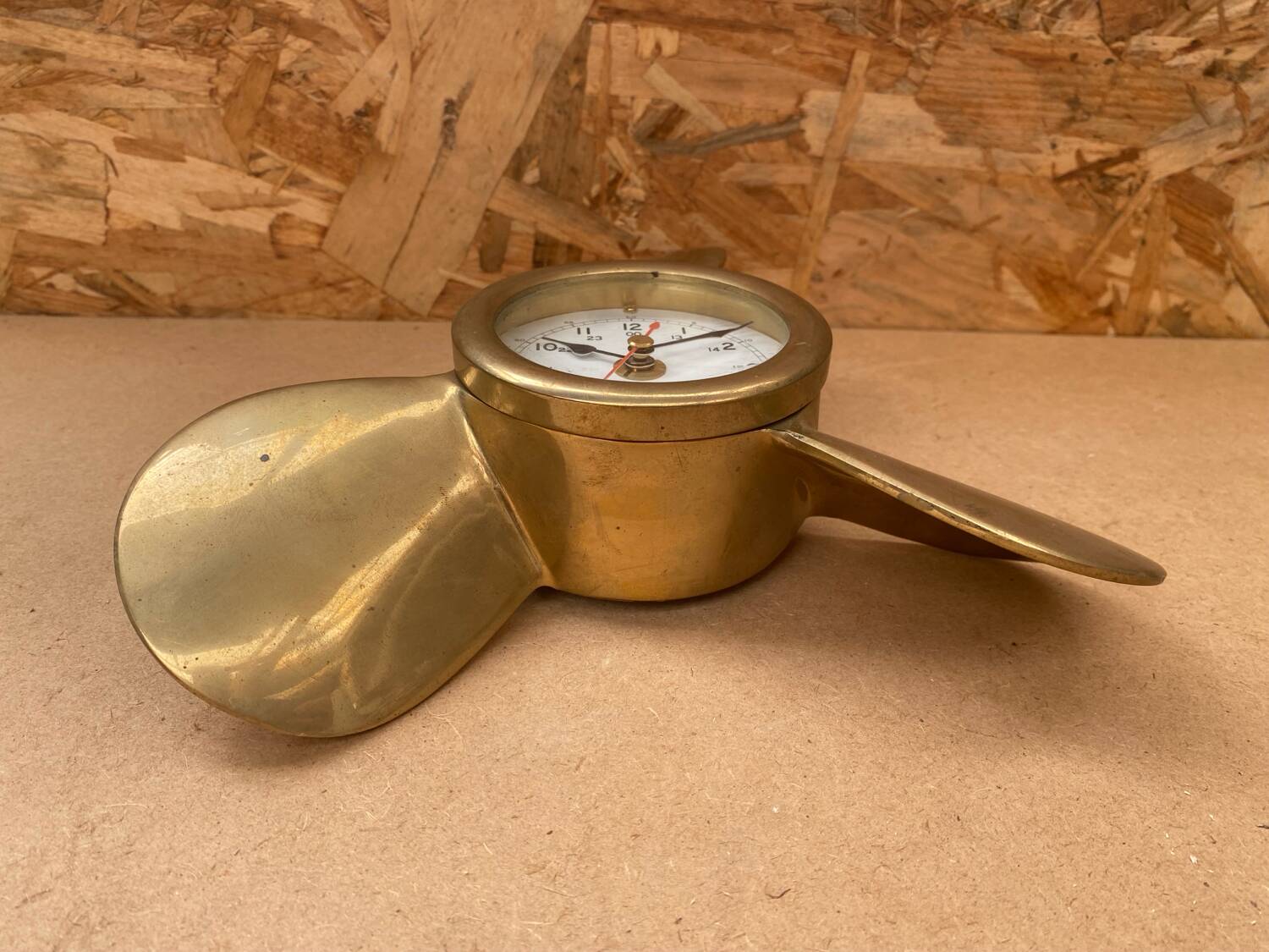 Antique brass propeller with pendulum vintage nautical wall clock