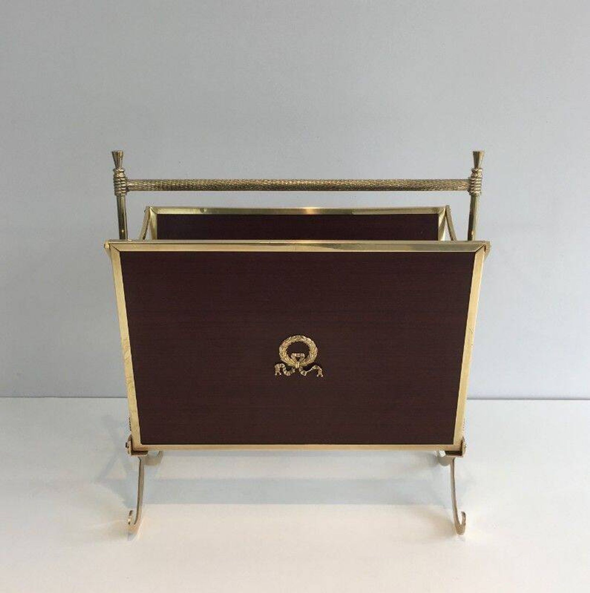 Pair of mahogany and brass magazine racks. Maison Jansen