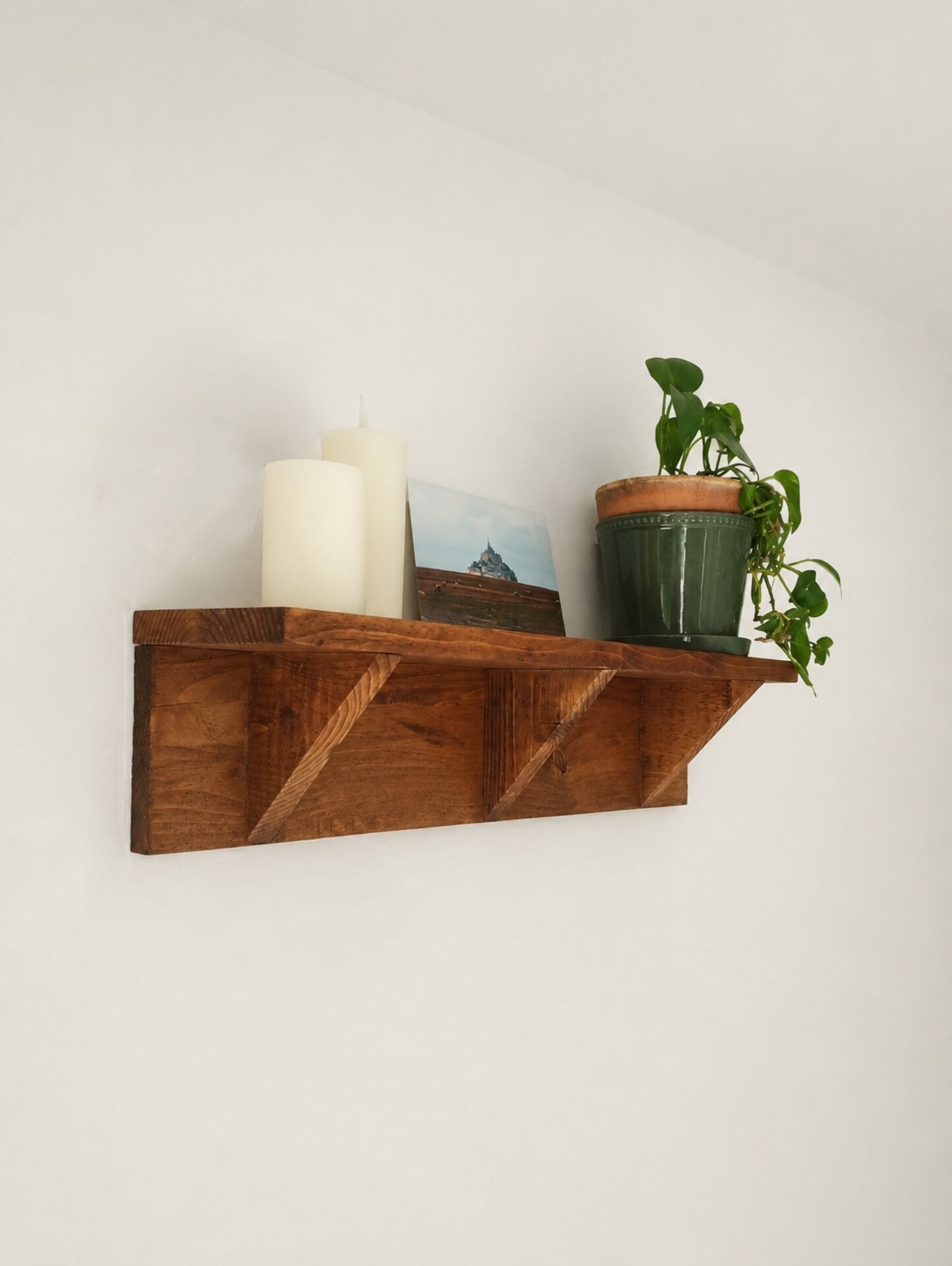 Handcrafted wall shelf in solid fir.