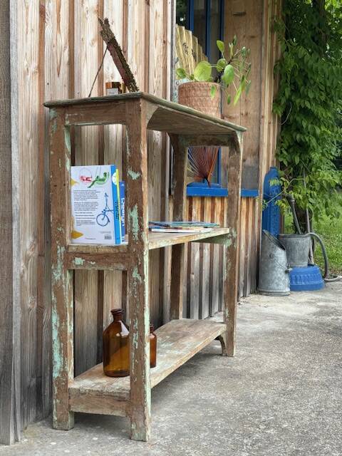 Teak shelves with a green patina