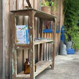 Teak shelves with a green patina